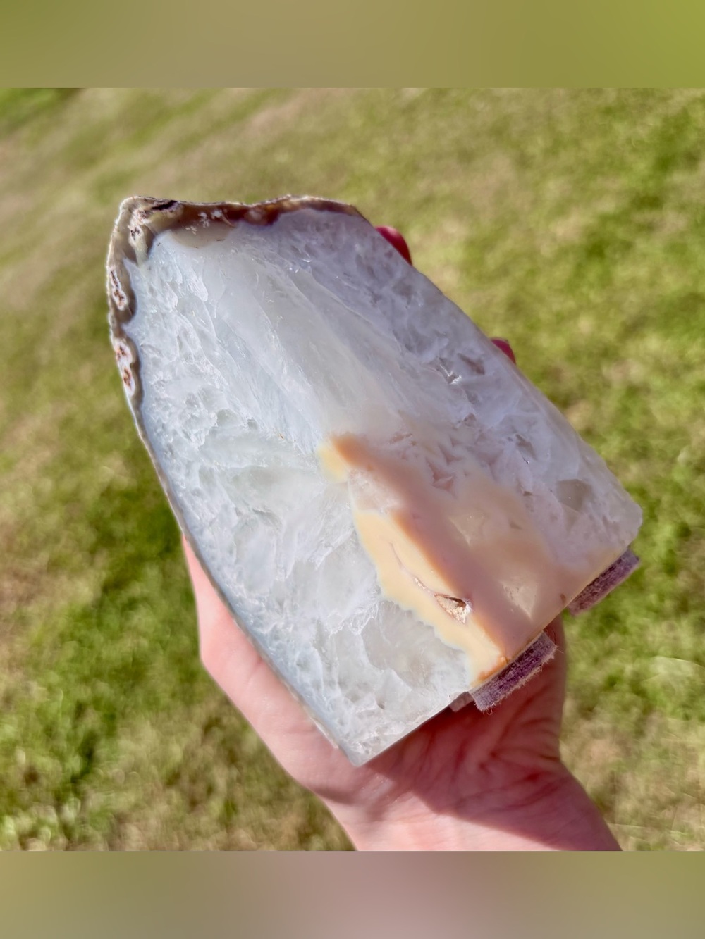 Handheld Polished White Agate Slice with Cream Band